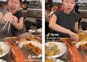 video di una donna morsa da un gambero in un ristorante