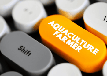 Tasto con scritta Aquaculture Farmer per rappresentare la transizione al nuovo ASC Farm Standard